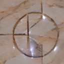 a transistor symbol carved into marble